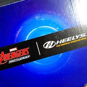 Size 9 mens/ Boys heelys